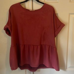 Peplum top size small but fits sizes L and XL